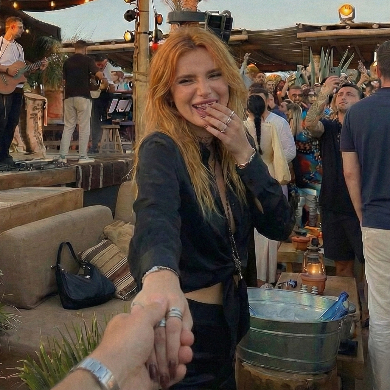 She's laughing, completely engaged